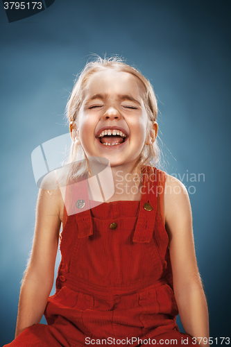 Image of Beautiful portrait of a happy little girl smiling