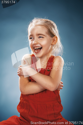 Image of Beautiful portrait of a happy little girl smiling