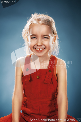 Image of Beautiful portrait of a happy little girl smiling