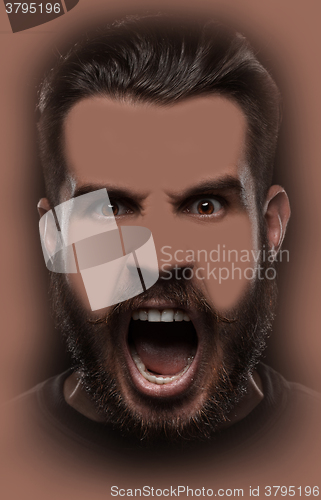 Image of Portrait of young screaming man 