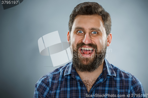 Image of Closeup headshot portrait, happy handsome business man in blue shirt