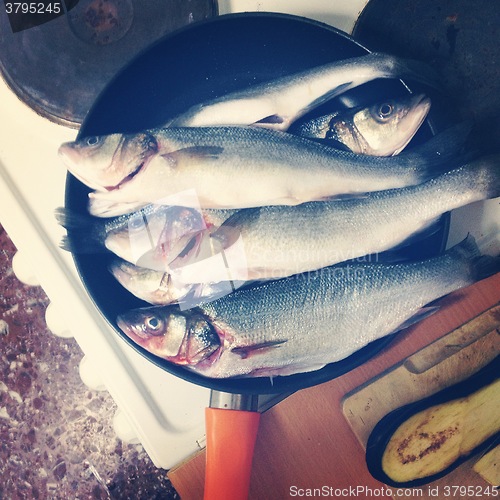 Image of Fresh Fish In A Frying Pan On The Table