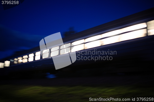 Image of Train passing by in the evening