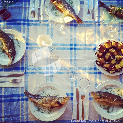 Image of Fried Fish On The Served Table