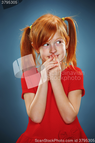 Image of Beautiful portrait of a thoughtful little girl 