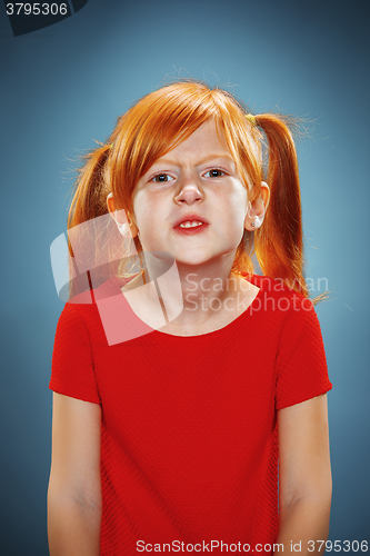 Image of Beautiful portrait of a displeased disaffected little girl 