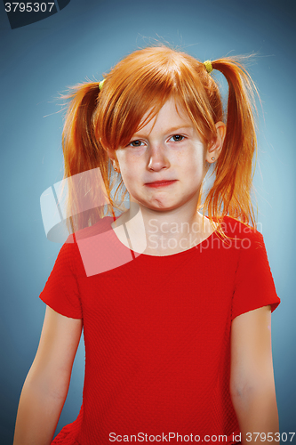 Image of Beautiful portrait of a thoughtful little girl 