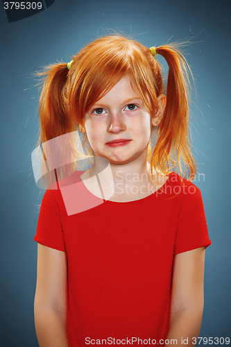 Image of Beautiful portrait of a thoughtful little girl 