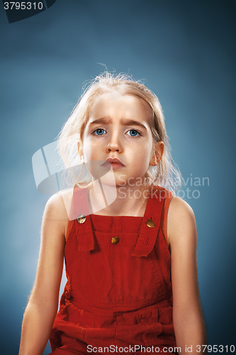 Image of Beautiful portrait of a thoughtful little girl 