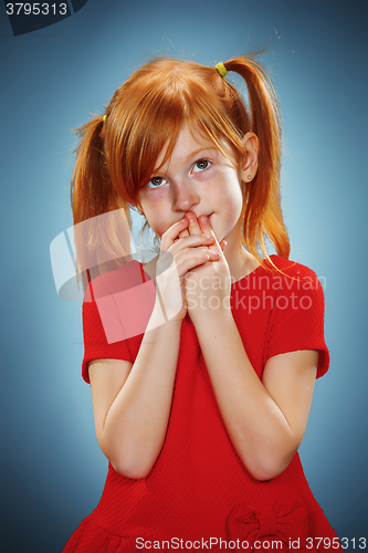 Image of Beautiful portrait of a thoughtful little girl 