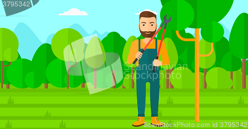 Image of Farmer with pruner in garden.