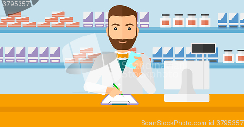 Image of Pharmacist taking notes.