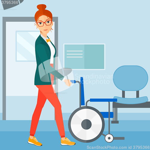 Image of Woman pushing wheelchair.