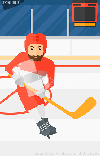 Image of Ice-hockey player with stick.