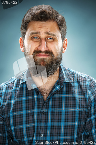 Image of The crying man closeup