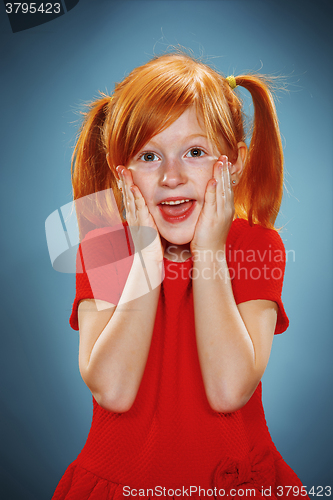 Image of Beautiful portrait of a surprised little girl 