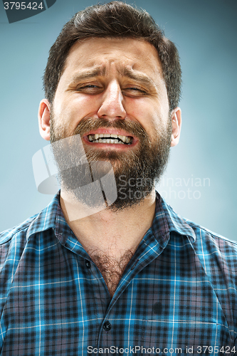 Image of The crying man closeup