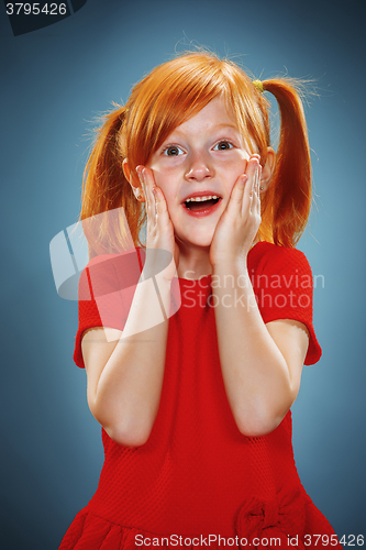 Image of Beautiful portrait of a surprised little girl 