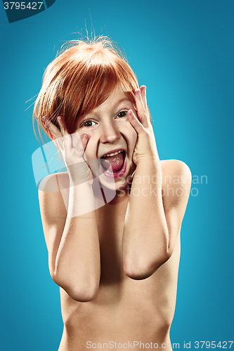 Image of Beautiful portrait of a happy little surprised girl