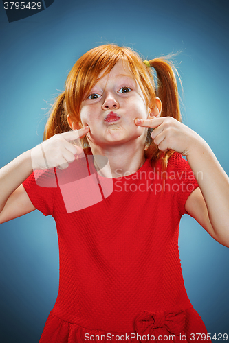 Image of Beautiful portrait of a happy little funny girl 