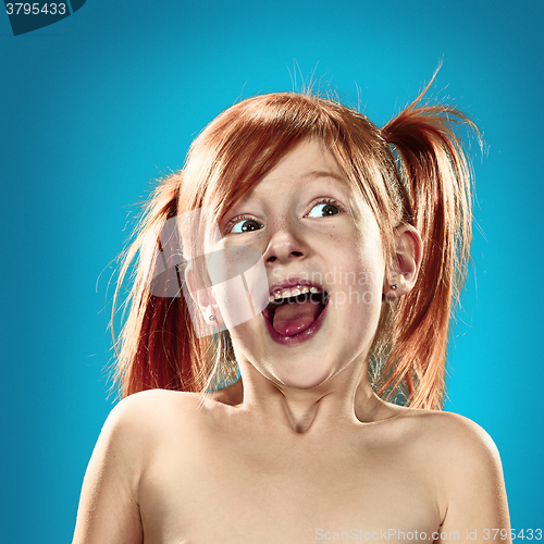 Image of Beautiful portrait of a happy little girl smiling