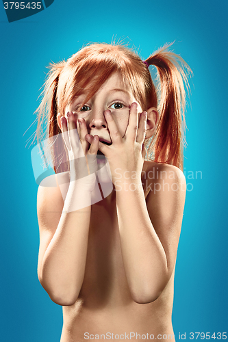 Image of Beautiful portrait of a surprised little girl 