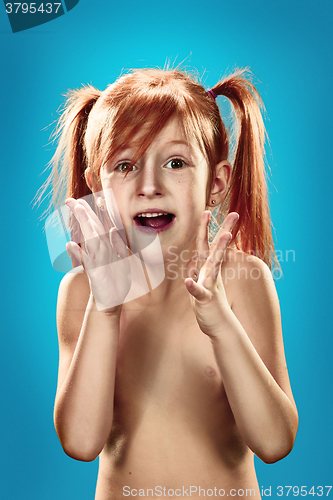 Image of Beautiful portrait of a happy little surprised girl