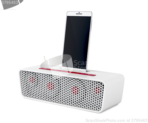 Image of Docking station speaker and smartphone