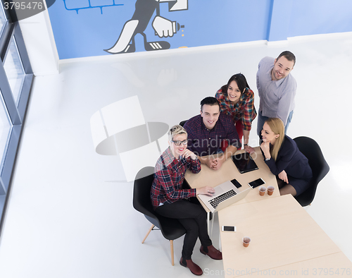 Image of aerial view of business people group on meeting