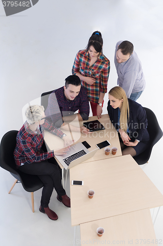 Image of aerial view of business people group on meeting