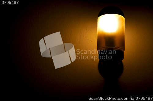 Image of night street lamp and a bulb  