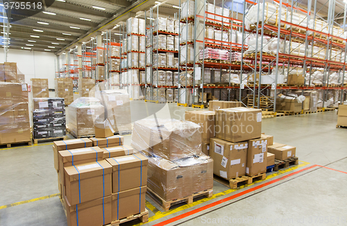 Image of cargo boxes storing at warehouse shelves