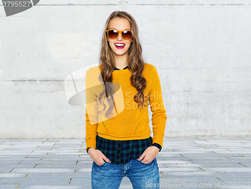 Image of happy young woman or teen girl in casual clothes