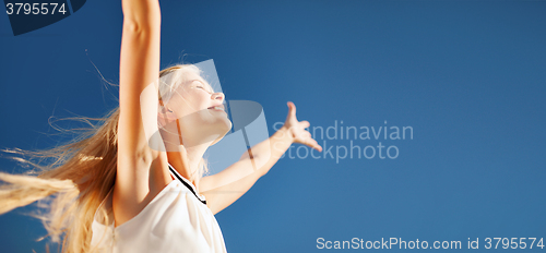 Image of beautiful woman enjoying summer outdoors