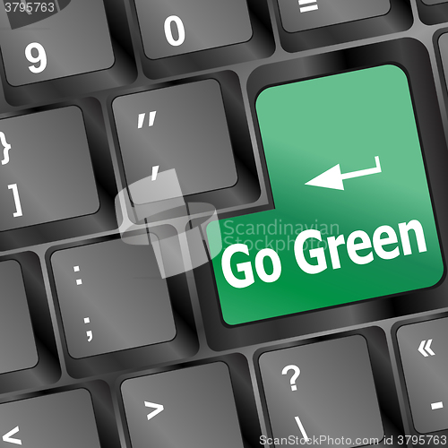 Image of A keyboard with a key reading Go Green vector illustration