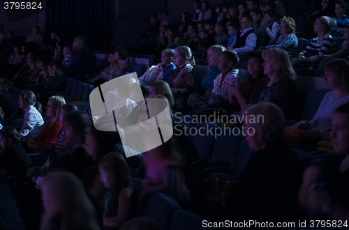 Image of Audience applauding, during a spectacular event