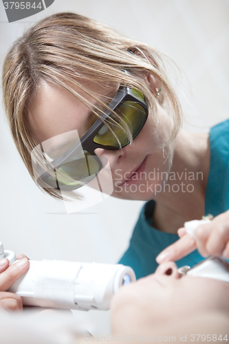 Image of Laser facial treatment in cosmetology clinic