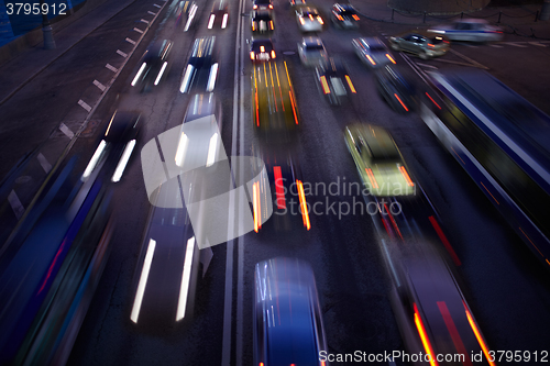 Image of Car traffic at night. Motion blurred background.