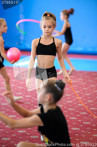 Image of Girls exercising during gymnastics class