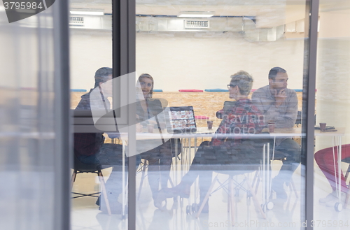 Image of startup business team on meeting at modern office