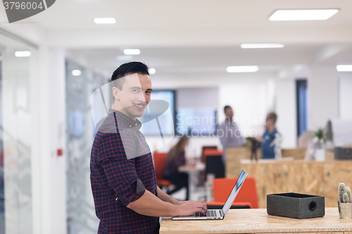 Image of startup business, young  man portrait at modern office