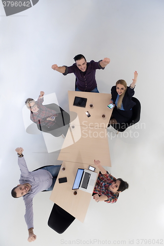 Image of aerial view of business people group on meeting