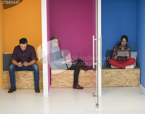 Image of group of business people in creative working  space