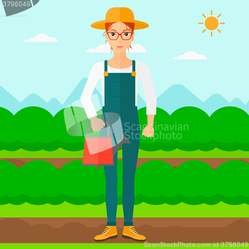 Image of Farmer with watering can.