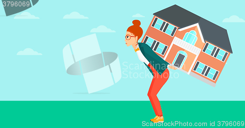 Image of Woman carrying house.