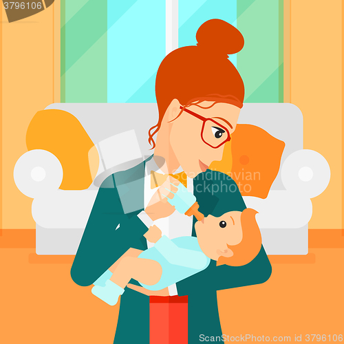 Image of Woman feeding baby.