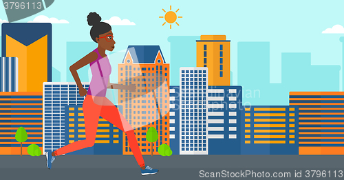 Image of Sportive woman jogging.
