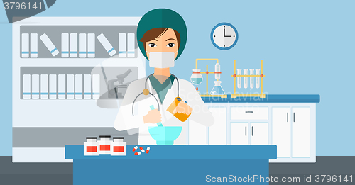 Image of Pharmacist preparing medicine.