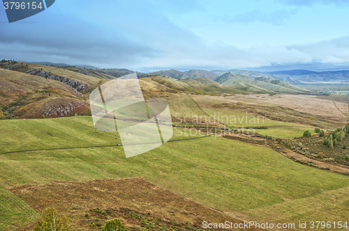 Image of mountains in autumn day