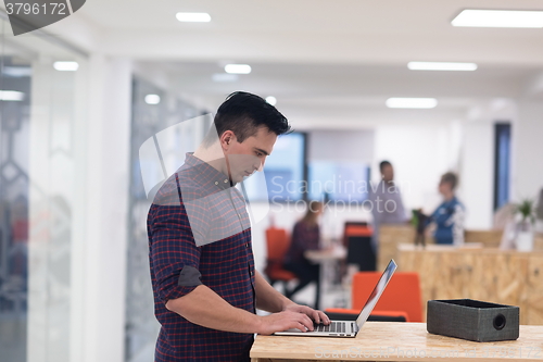 Image of startup business, young  man portrait at modern office